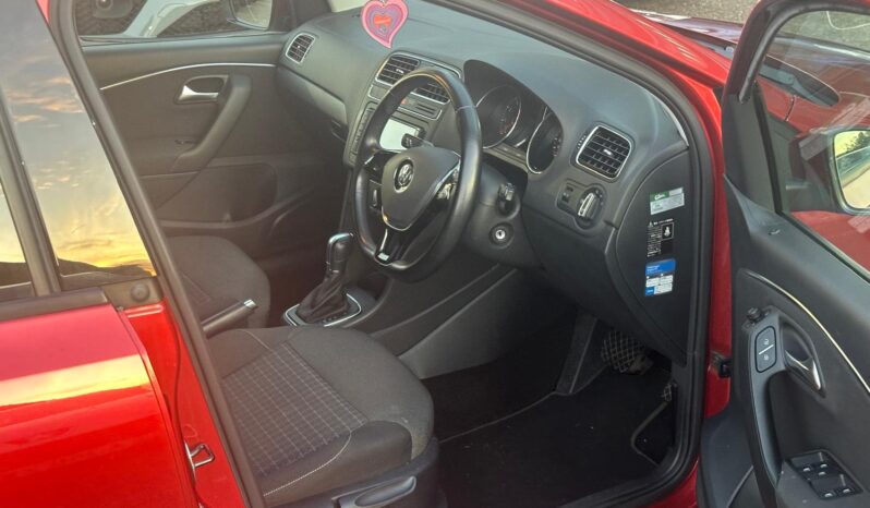 
								2014 Red Volkswagen Polo full									